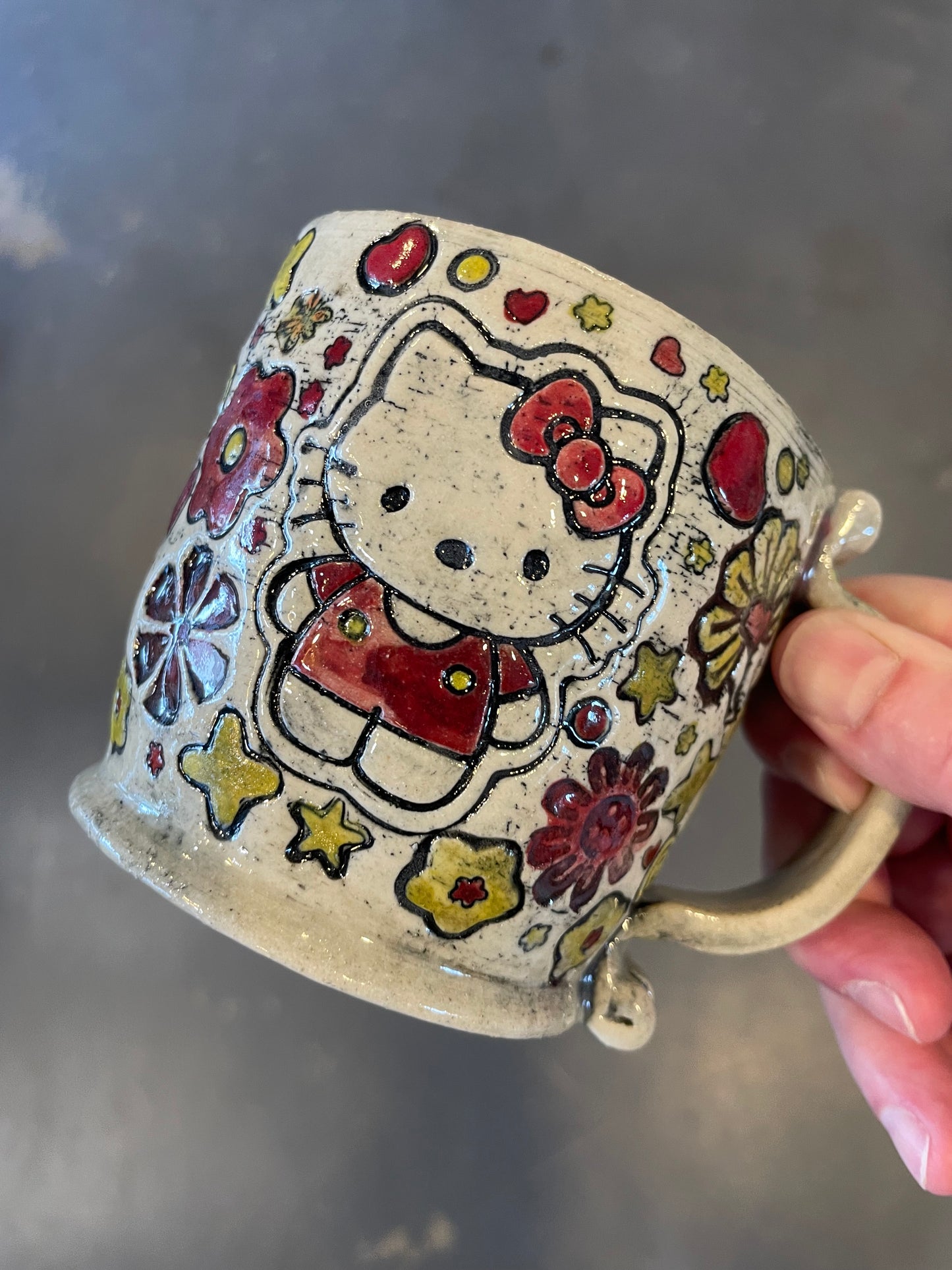 H3llow Kittie in Red Mug