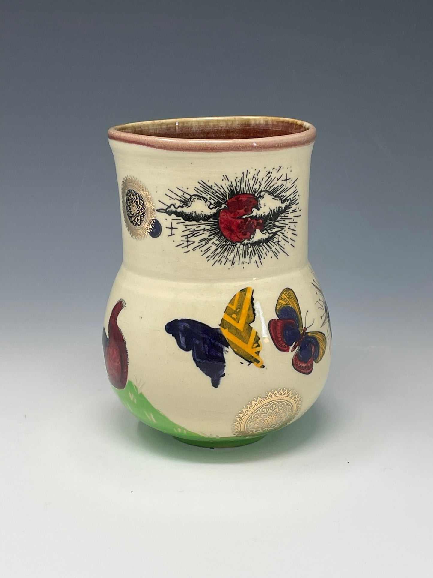 Butterflies and Floating Patterns Tumbler