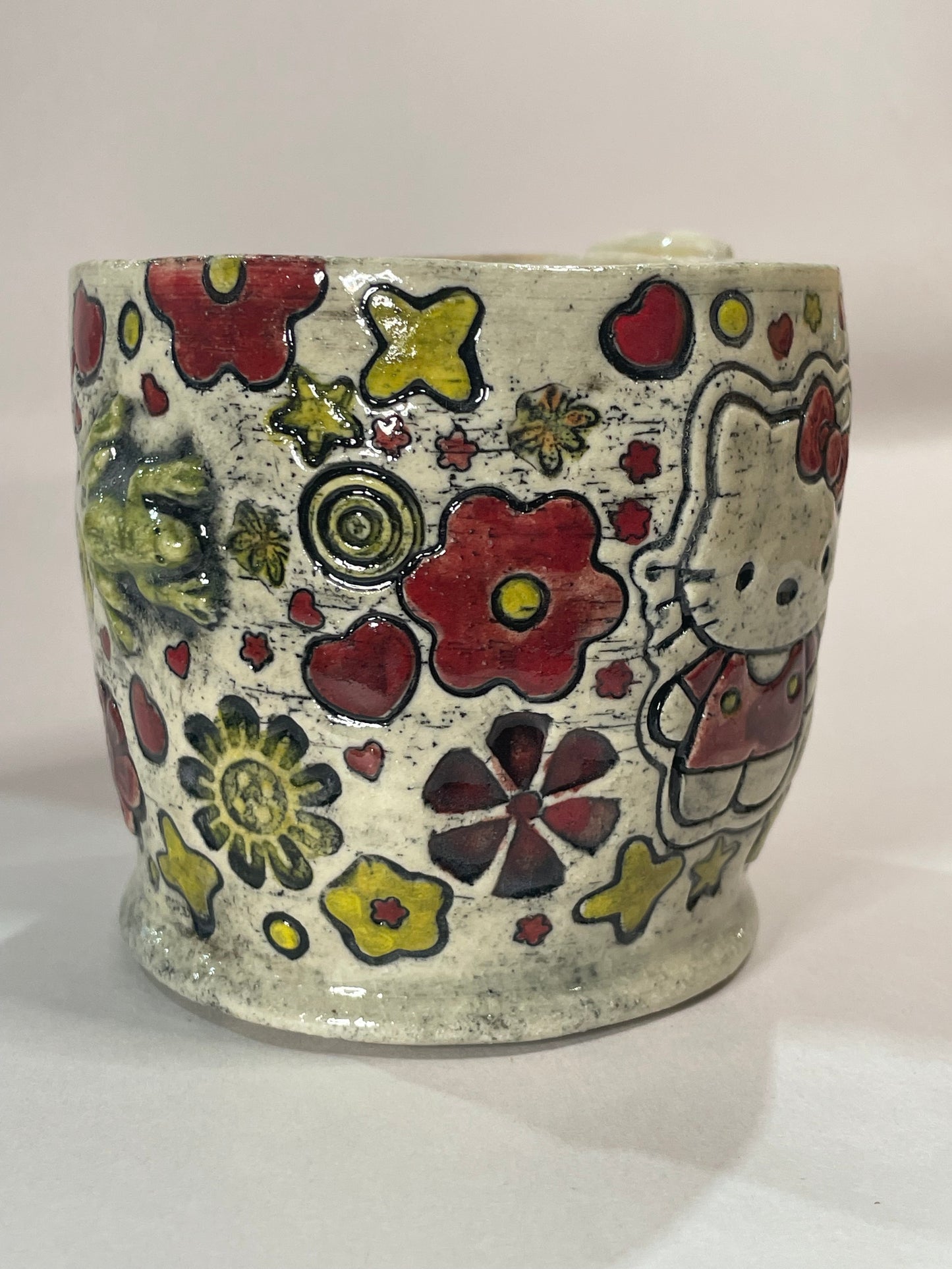 H3llow Kittie in Red Mug