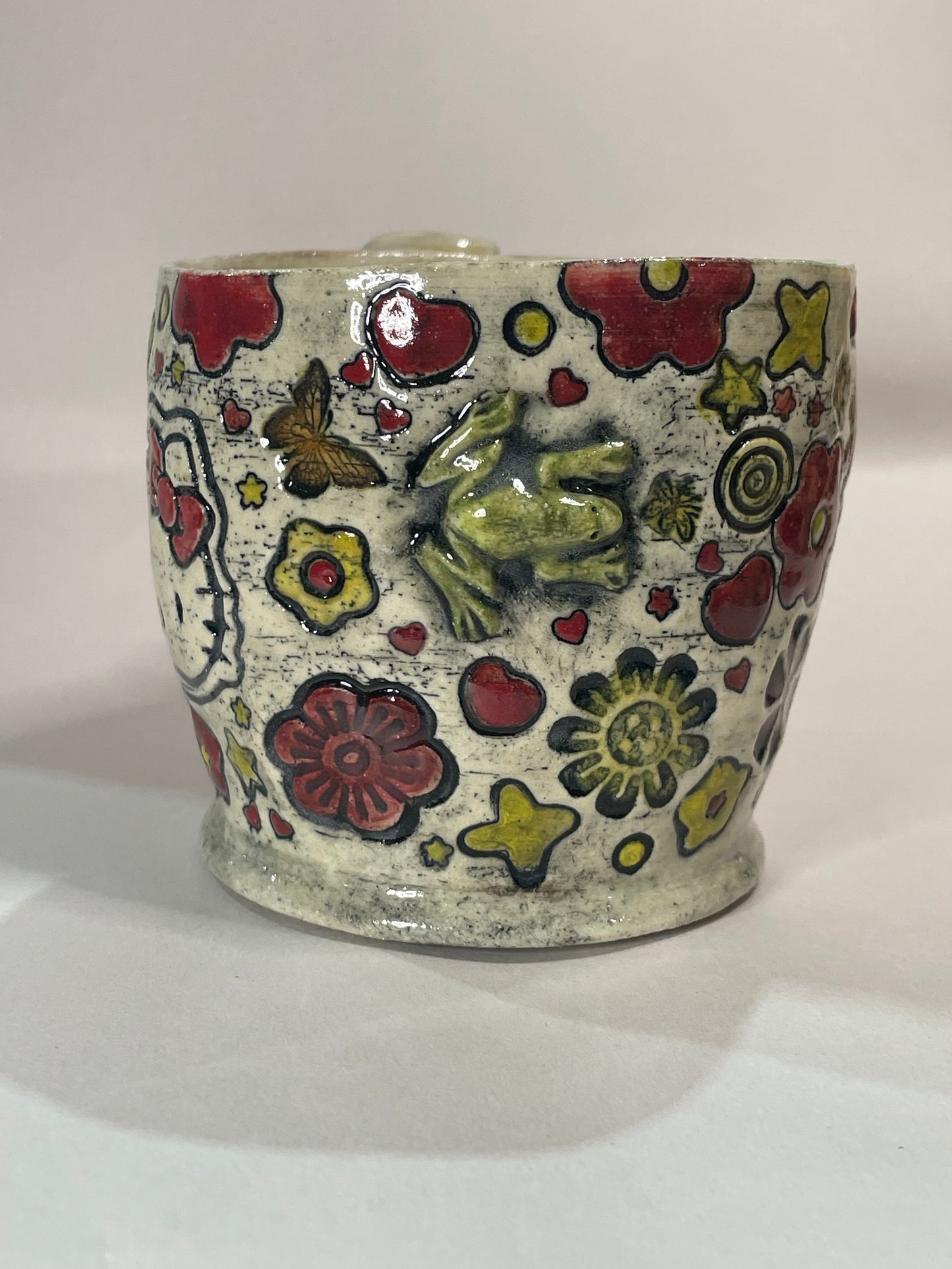 H3llow Kittie in Red Mug