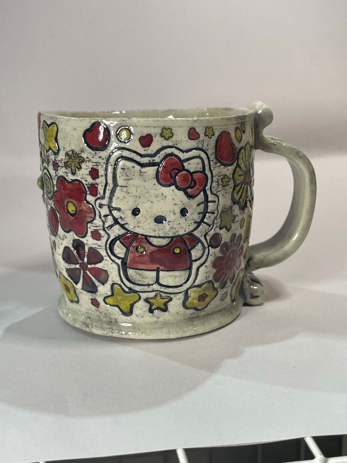 H3llow Kittie in Red Mug