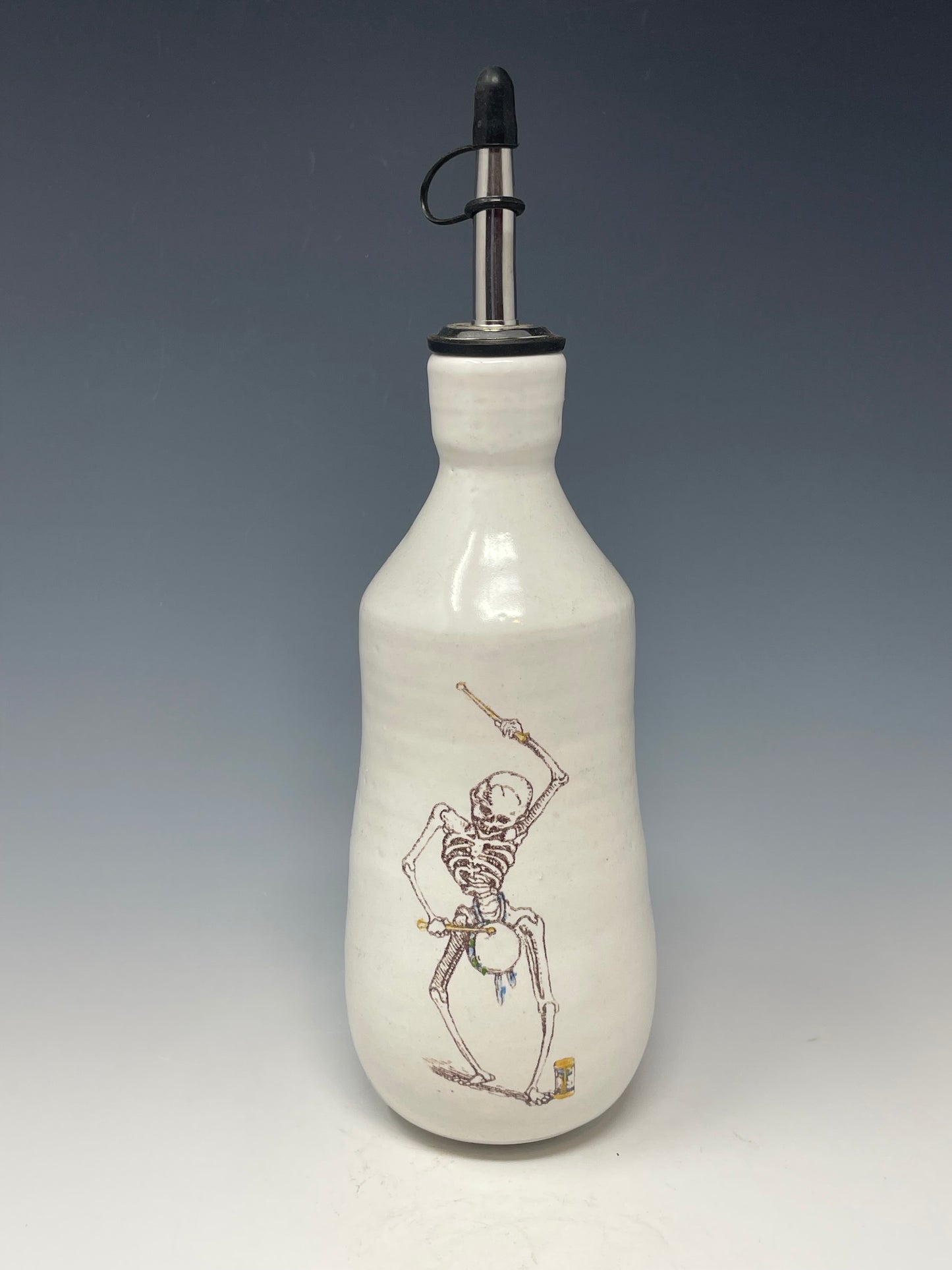 Red & Blue Bird Roost oil bottle